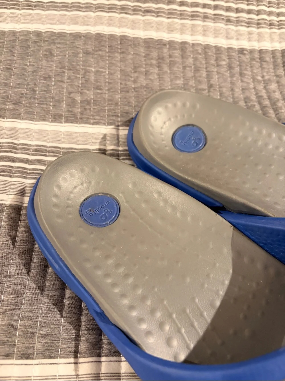 NWOT Crocs Men’s 9/women’s 11 Blue and Gray Slide Sandals